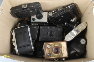 A Halina 35x camera, an Agfa Isolette folding camera x 2, a Brownie and a Kodak folding camera, Kodak Brownie 127 camera, a Brownie flash box camera, a Brownie model 1 box camera and 6 box cameras 