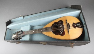A Victorian 8 stringed mandolin, labelled Gav.Giovanni De Meglio E Figlio anno 1899 mod (a) FL9088 