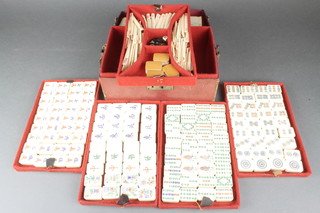 A bone and bamboo mahjong set complete with counters, cased 