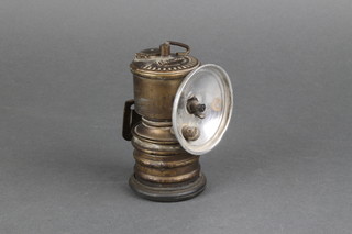 A Miner's carbide safety lamp 