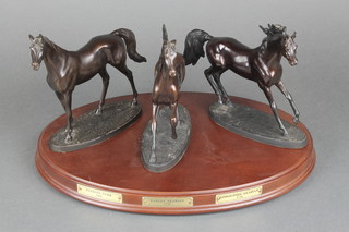 National Horse Racing Museum and Franklin Mint, three bronzes of the champions - Godolphin Arabian, Darley Arabian and The Byerley Turk, 7" high, raised on a mahogany base  