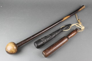A lignum vitae knob kerry, a turned and weighted truncheon 12" and a bog oak   shillelagh marked Erin 12" 