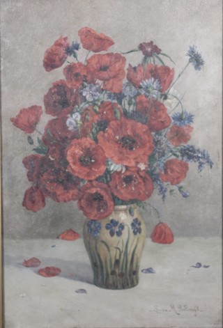 Louisa M Bancroft, oil on canvas, a still life study of a vase of flowers, signed and inscribed on verso 21 1/" x 14 1/2" 