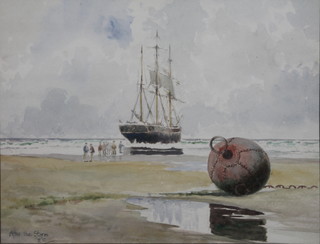 An early 20th Century watercolour, study of a beached ship with figures and buoy, inscribed and monogrammed 8 1/2" x 10 1/2"  