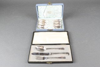 A cased silver 3 piece christening set, London 1946 with chased monogram, 6 Continental silver plated cased teaspoons