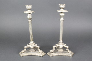 A pair of classical style silver plated table lamps with reeded columns and stylised hoof feet, on trefoil bases 20"