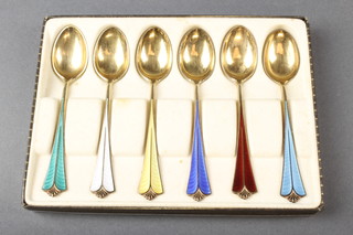 A boxed set of 6 Norwegian silver gilt and guilloche enamelled coffee spoons  