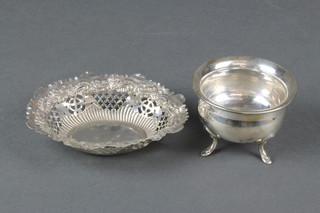 A baluster silver bowl on scroll legs and a repousse silver bon bon dish, 108 grams
