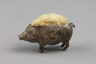 An Edwardian silver novelty pin cushion in the form of a pig 1.75" 