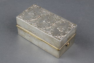 A Victorian repousse silver Reynolds Angels toilet box, London 1897