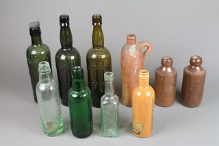 A collection of Victorian and other glass and stoneware bottles