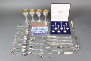 4 silver plated chased goblets and minor plated cutlery including a silver teaspoon and 5 foreign silver spoons