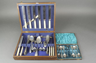 A cased set of 6 silver plated pierced teaspoons and nips, a part canteen of cutlery