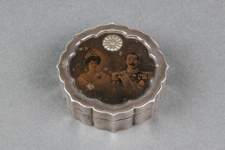 An early 20th Century Japanese silver floral shaped snuff box, the lid with brass mon and a portrait of The Emperor and his wife 2" 