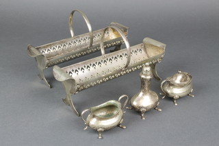 A silver plated 3 piece condiment and 2 dishes