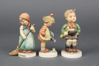 3 Hummel figures - girl watering a flower 4 1/2", girl sweeping 4 1/2" and boy with trumpet 5"