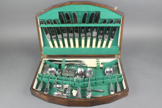 An oak canteen of silver plated cutlery 