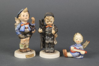 3 Hummel figures - a seated angel 2 1/2", home from market 4" and a boy chimney sweep 4" 