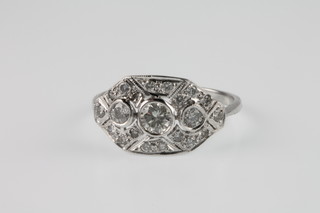 An 18ct white gold Art Deco style 3 stone diamond cluster ring, approx 0.75ct, size L 1/2