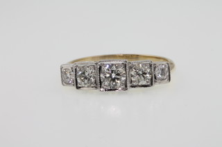 An 18ct yellow gold graduated 5 stone diamond stepped mount ring, approx 0.90ct, size M 1/2 