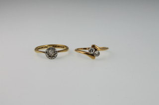 2 18ct gold diamond rings - a 2 stone cross-over and a cluster, sizes K and L 1/2