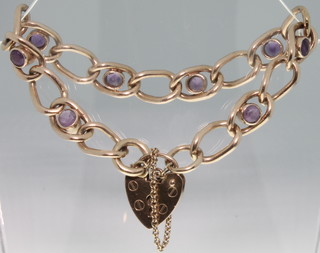 A rose gold 9ct hollow link bracelet set with amethysts and a ditto padlock, 16 grams