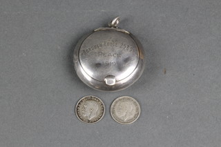A silver compact with engraved inscription Birmingham 1918 and 2 threepenny coins dated 1919 and 1935 