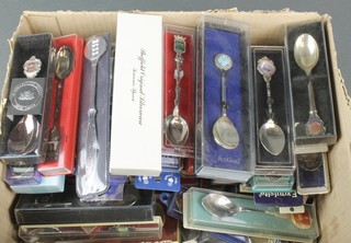A quantity of souvenir spoons 