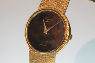 A gentleman's 18ct gold Chopard automatic wristwatch with tigers eye face, gross approx. 66 grams