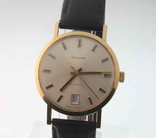 A gentleman's 9ct gold Garrard calendar wristwatch with presentation inscription 
