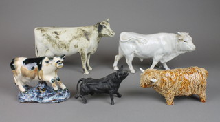 A Studio pottery figure of a cow 8", 4 others 