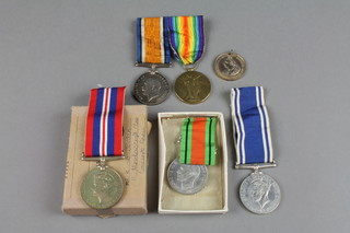 Family medals, a World War One pair to 210669 SPR. W.J. Jordan. R.E. together with a World War Two posting box to K. W. Jordan enclosing a British War medal and Defence medal and a Police Long Service Good Conduct medal to Const. William J. Jordan 