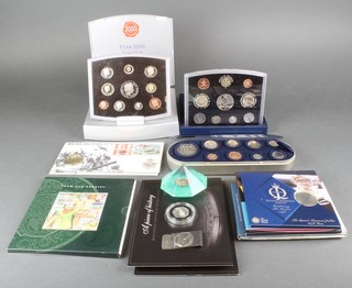 A 2000 time capsule and minor proof crowns and coins etc 
