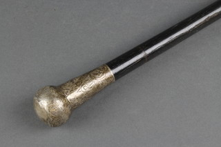 An Edwardian ebonised walking cane with engraved silver knop