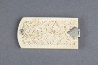 A carved Cantonese aide memoir decorated with flowers 2 1/2" 