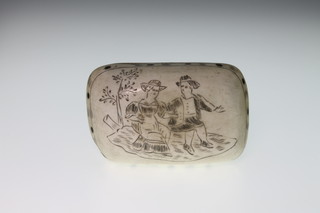 Scrimshaw, an early 19th Century carved horn snuff box, the lid decorated with a dove, the body with script and scrolls of flowers, the underside with a courting couple 1 1/4"