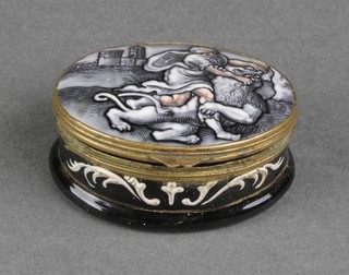 A 19th Century oval enamelled trinket box decorated with a figure wrestling a lion  1 1/2" 