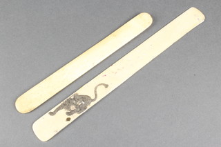 A Japanese ivory paper knife with lion decoration 9" and 1 other 