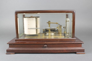 A barograph contained in a mahogany and bevelled glass case, the base fitted a drawer, raised on bracket feet 