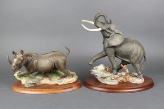 2 Franklin Mint figures - Hunter 11" and Ruler of the African plains 12" 