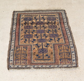 An Afghan blue and red ground prayer rug, some wear 52" x 33"