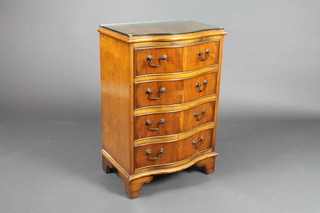 A Georgian style yew chest of serpentine outline fitted 4 long drawers with brass swan neck drop handles, raised on bracket feet 28 1/2"h x 20"w x 12 1/2"d