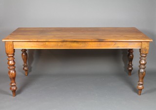 A Victorian style "Irish oak" rectangular dining table, raised on turned supports 29"h x 70"l x 37"w 