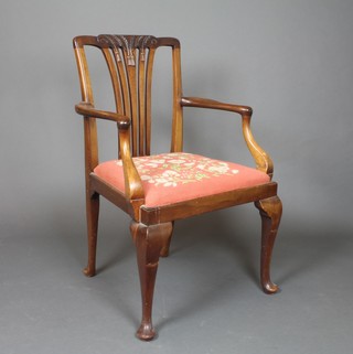 A Hepplewhite style mahogany splat back open arm chair, raised on cabriole supports with Berlin woolwork seat