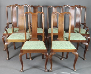 A set of 8 Queen Anne style walnut slat back dining chairs with upholstered drop in seats, raised on cabriole supports - 2 carvers, 6 standard 