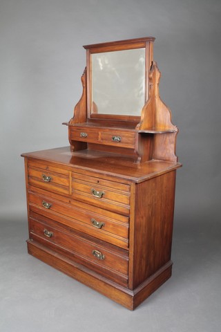An Edwardian walnut dressing chest with swing mirror fitted 2 glove drawers above 2 short and 2 long drawers 62 1/2"h x 42"w x 20"d