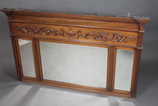 An Edwardian triple plate over mantel mirror contained in a carved walnut frame with moulded cornice and Grecian key decoration and fluted columns to the sides 34"h x 57"w x 4"d 