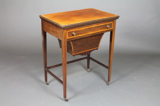An Edwardian rectangular inlaid and crossbanded mahogany card/work table, fitted a frieze drawer above a deep basket, raised on square tapering supports 29"h x 24"w x 16"d 