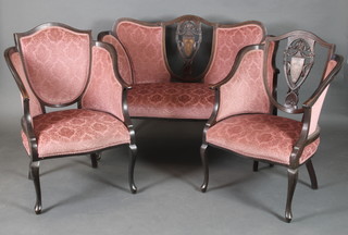An Edwardian inlaid mahogany 3 piece settee suite comprising 2 seat settee with pierced shield back to the centre, tub back chair, shield shaped back chair, upholstered in pink dralon, on cabriole supports 