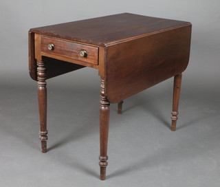 A Victorian mahogany Pembroke table fitted a frieze drawer 28"h x 34"w x 19" when closed x 41 1/2" when open, raised on turned supports 